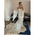 Abiti da sposa a sirena alla moda rimovibili a maniche lunghe eleganti ricami in pizzo da spiaggia abiti da sposa bohémien personalizzati da festa