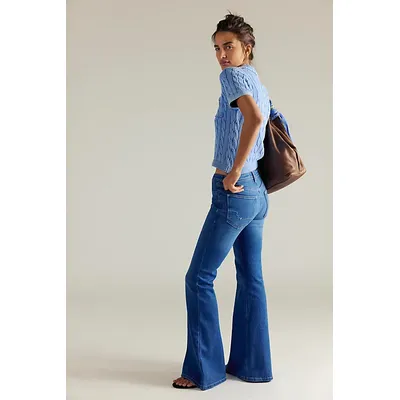 We The Free Love Bomb Flare Jeans at Free People in Explosive, Size: 27