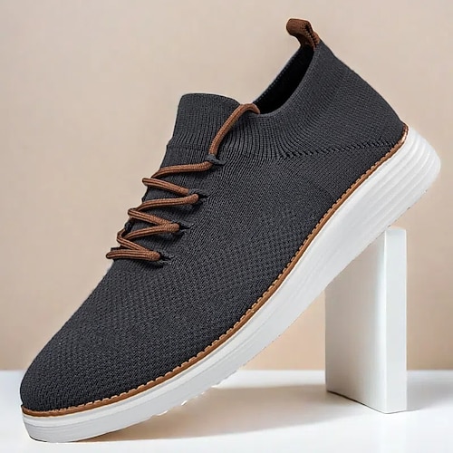 marineblaue Strick-Sneaker für Herren mit Schnürung und gepolsterter Sohle für bequemes Tragen im Alltag Image