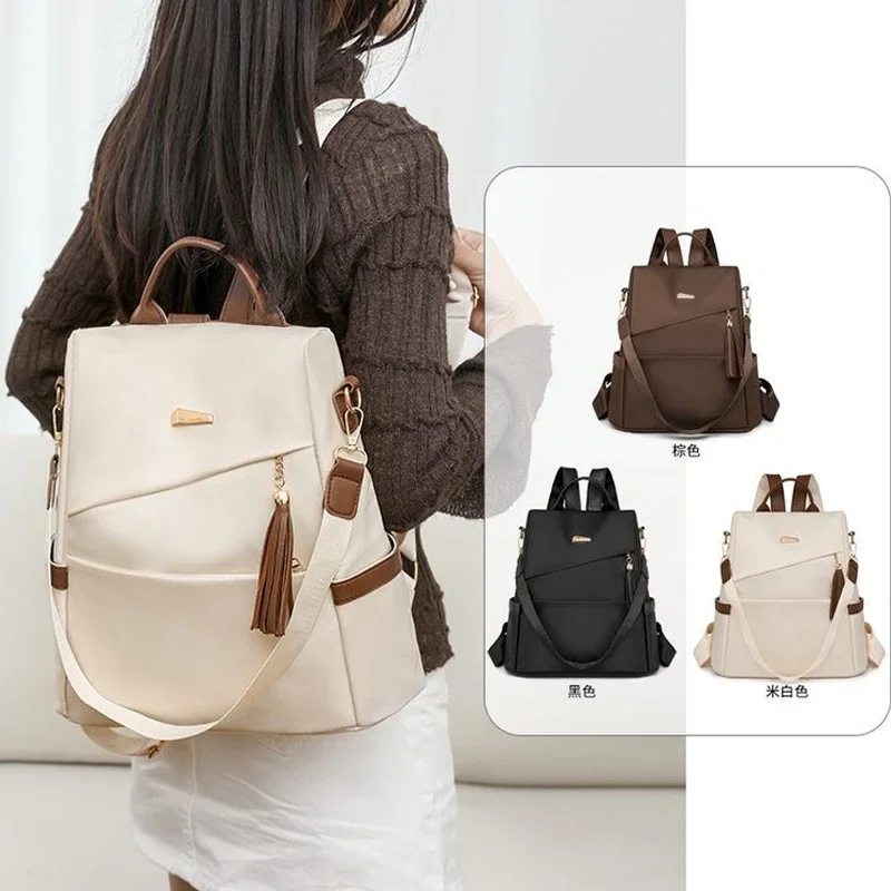 Mode frauen Nylon Anti-diebstahl Rucksack Quaste Dekorative Casual Reise Weibliche Schulter Tasche Große Kapazität Student Schule Pack