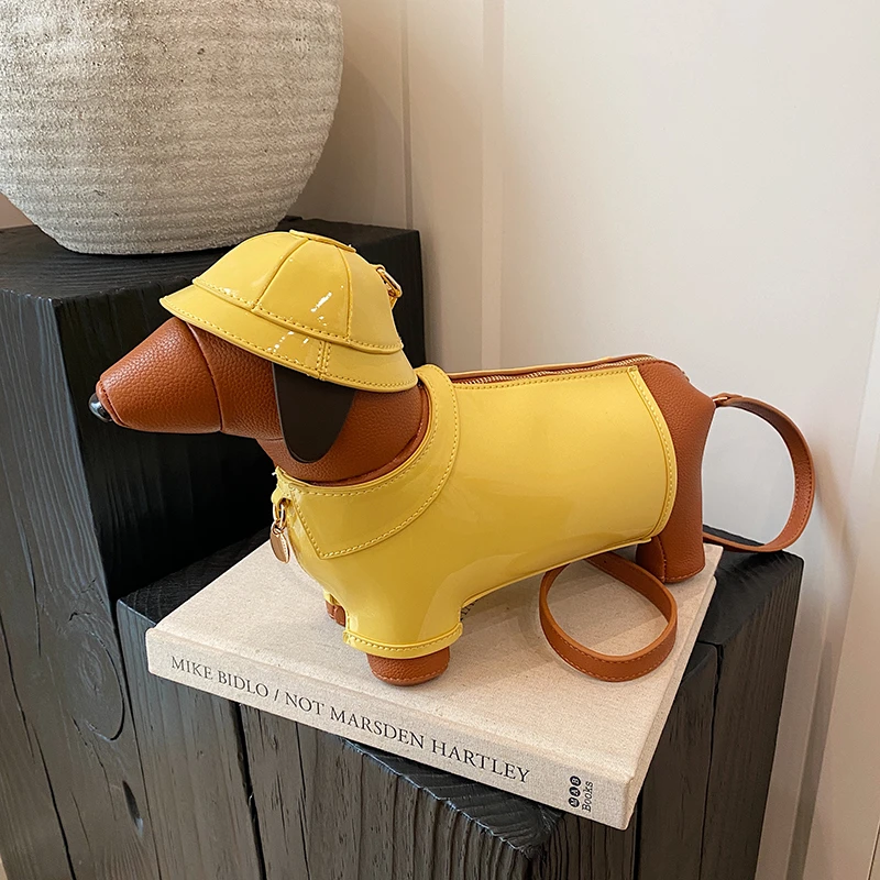 Mode exquis jaune chien PU en forme de baril sacs à bandoulière chaud à la mode Super Cool personnalité sacs à bandoulière pour les femmes 2025 nouveau