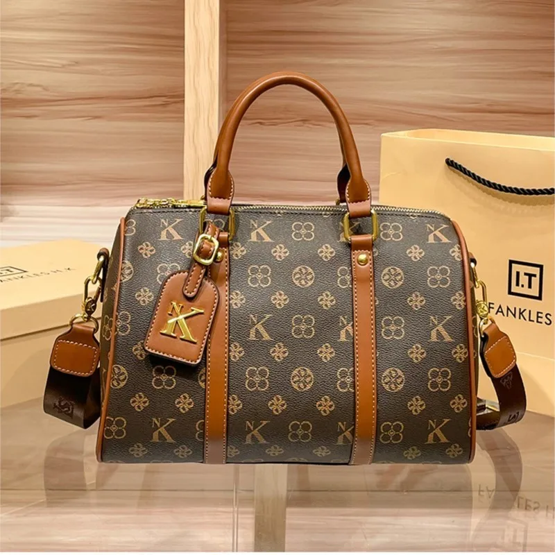 Borsa a mano di lusso leggera da donna 2025 Nuova borsa a tracolla portatile retrò di moda di design di lusso primaverile Borsa a tracolla di grande capacità