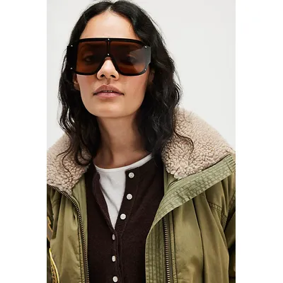 Cooper Oversized Shield Sunglasses at Free People in Pine Green