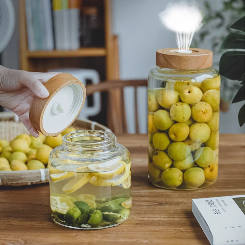 Versiegeltes Vorratsglas aus Glas mit Einweg-Auspuff, selbstgemachte Fruit-Wein-Gärungsflasche, transparentes Glas, leeres Flaschenglas Image