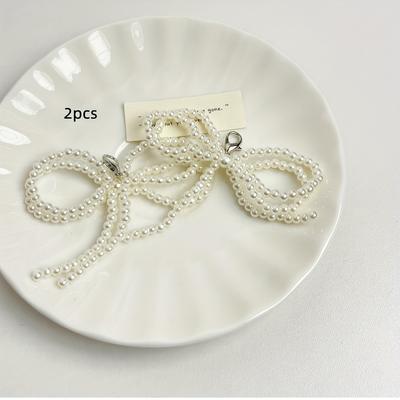 TEMU 2pcs Elegant Pearl Bow Shoelace Buckles - Trendy For Sneakers & Boots Image