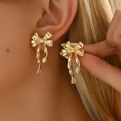 TEMU 2pcs Golden Bowknot Stud Earrings For Women – Elegant & , Alloy With Stainless Steel Posts, Casual Attire And Parties, Novelty Earrings Image