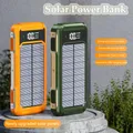 Solar Power Bank Caricatore portatile di grande capacità da 100000 mAh Ricarica rapida con quattro cavi Luci a LED Display digitale per telefoni