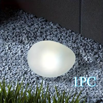 TEMU This Exquisite Outdoor Solar Garden Light Set Features A Smooth And Realistic Pebble Design, Serving As A Stylish Decorative Rock Lamp. And A Cool, Soft White Light. Image