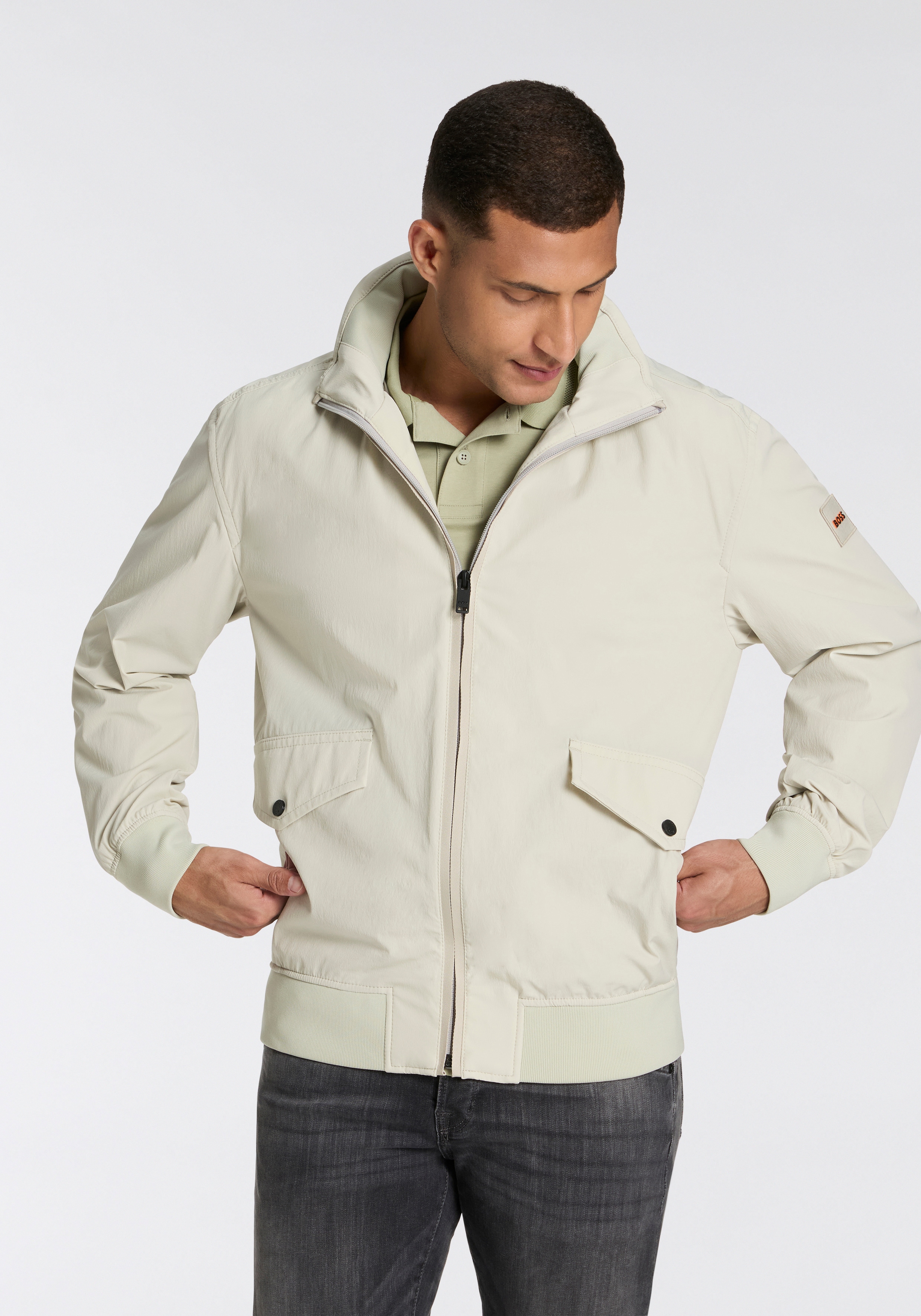 Allwetterjacke BOSS ORANGE "Ohice", Herren, Gr. 52, beige (light beige271), Web, Obermaterial: 88% Polyamid, 12% Elasthan, unifarben, regular fit hüftlang, Strickbündchen, Jacken, wasserabweisend Kapuze verstaubar abnehmbar Strickbündchen Stehkragen