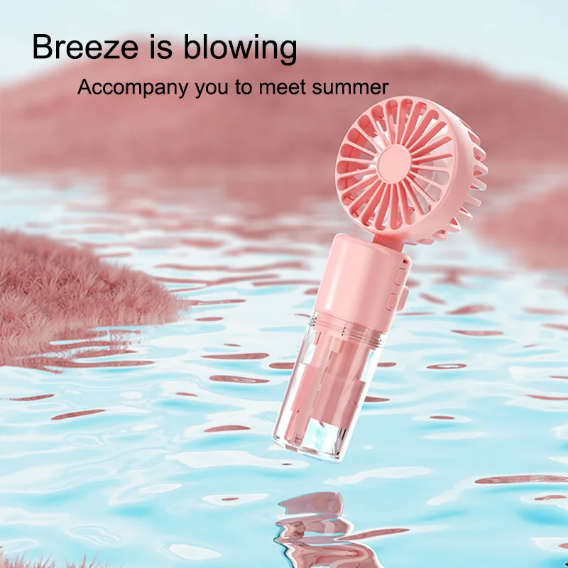 Tragbarer wiederaufladbarer Hand-Sprühventilator, USB-Schnellladung, Mini-Dampf, ein kühlendes Artefakt für Reisen und Outdoor-Szenen Image