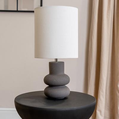 Stacked Abstract Ceramic Table Lamp with Tall Linen Drum Shade