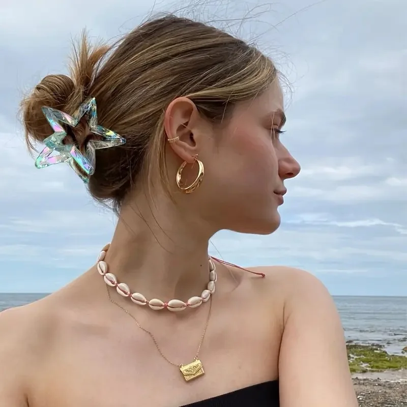 Vielseitige und hochwertige bonbonfarbene Laser-Hohlstern-Haarspange für Frauen Image