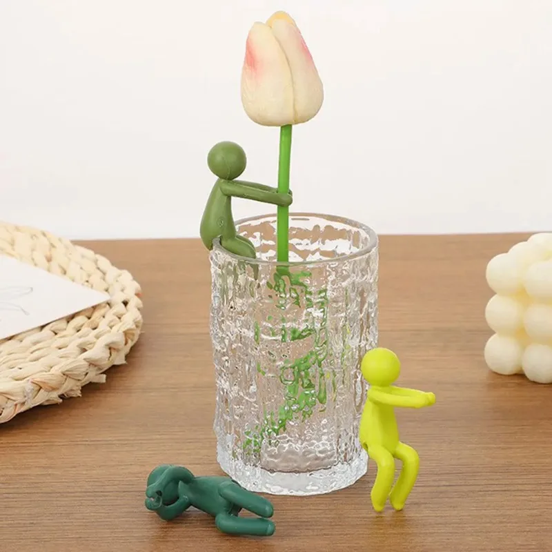 Neues Produkt, Pflanzenunterstützung, kreativer kleiner Charakter, Pflanzenanbau, Innenbereich, Blumenpflanze, Rebe, Kletterhalterung Image