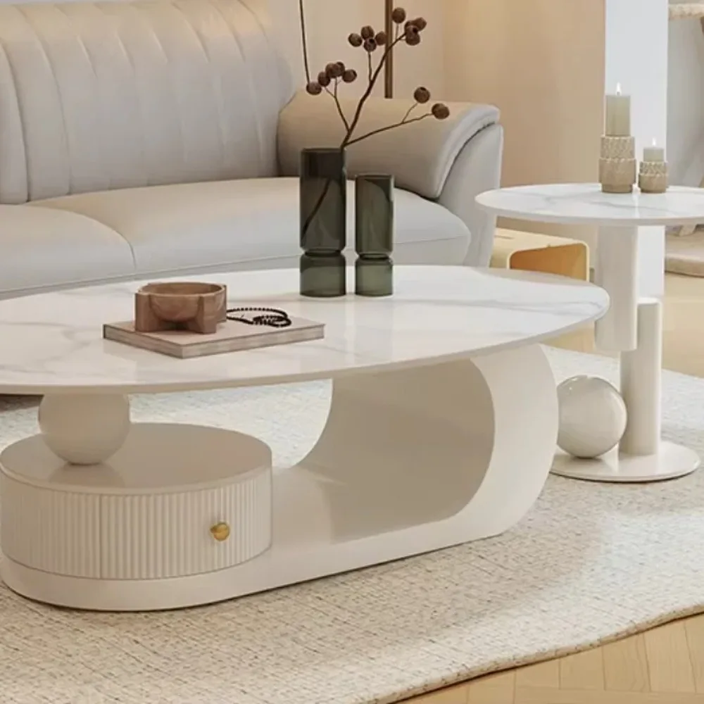Cremefarbener kreativer Couchtisch für Wohnzimmer, oval, für kleine Wohnung, italienischer Stil, minimalistischer Steinplatten-Teetisch