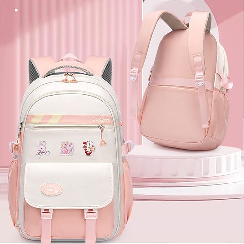 Zaino scolastico capiente per ragazze preadolescenti, leggero e multi-scomparto, con graziose spille, ideale per la scuola elementare e media, il ritorno a scuola, i viaggi e l'uso quotidiano.