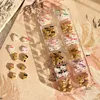 1 Box Tanning Hello Kitty Nail Art Charms 72 Stück gemischtes Harz Kawaii Sommer schwarze Haut Hello Kitty Nageldekorationen Maniküre Teile