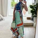 Elegante abito da sera stampato nuovo bohémien Temperamento O-collo Abito a vita alta Nuovo abito lungo con giunture irregolari senza maniche in raso