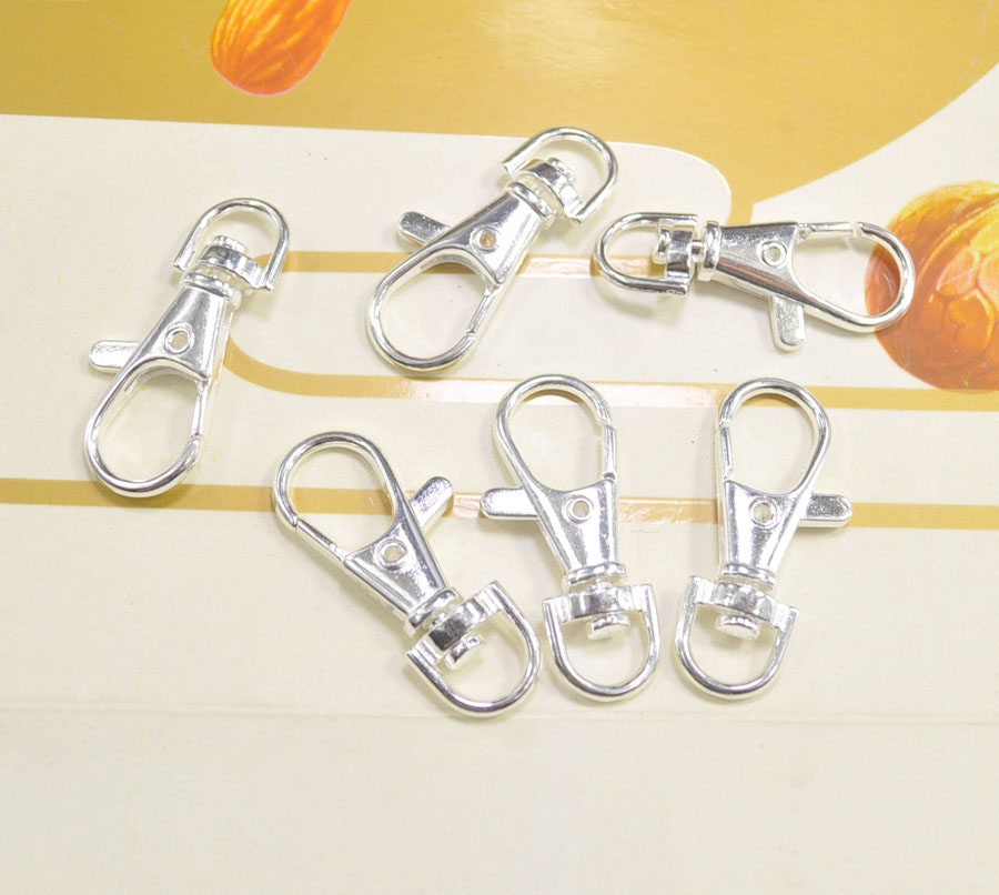 50 pezzi di moschettone girevole in argento, grandi fermagli per portachiavi, ganci per portachiavi, connettori, fermaglio a moschettone -- 38 x 15 mm