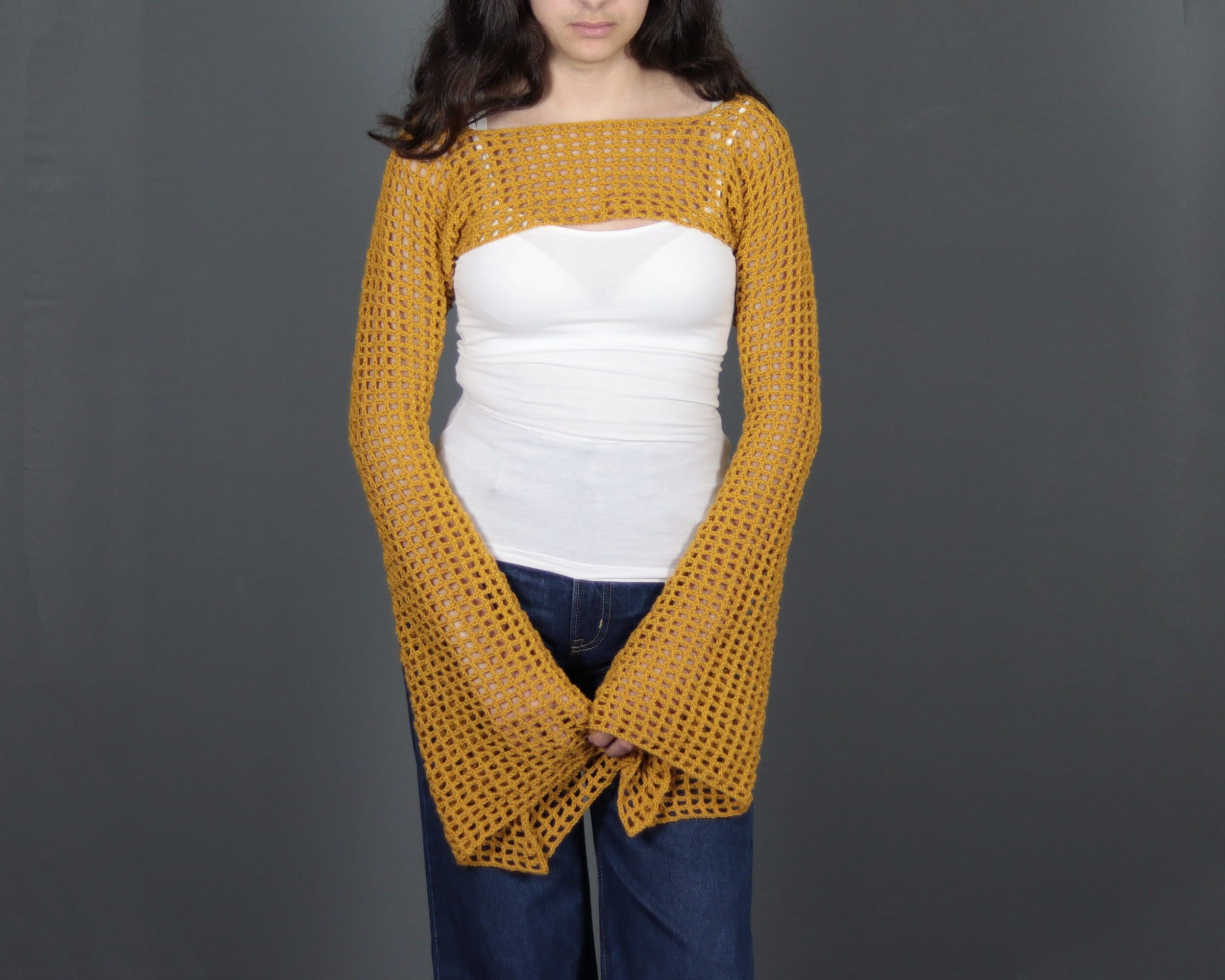 Modello top all'uncinetto, maniche in rete all'uncinetto, top corto all'uncinetto, modello top in pizzo all'uncinetto, modello top all'uncinetto da do