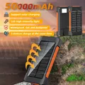 Power Bank esterno portatile di grande capacità da 50000 mAh Power Bank di emergenza con ricarica solare impermeabile per Iphone Samsung Xiaomi