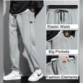Pantaloni sportivi da jogging in cotone 95% per uomo Pantaloni sportivi giornalieri Vendite calde Casual Versatile 2025 Nuovo abbigliamento da uomo Four Seasons
