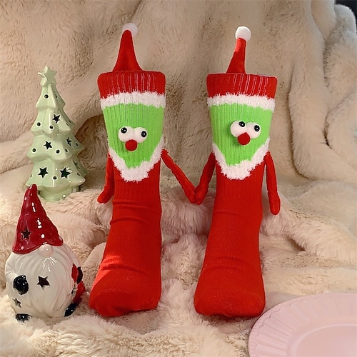 Magnetische Socken, Weihnachtssocken der Winteredition, rote Weihnachtsstrümpfe mit Schaldesign, dekorative magnetische Socken mit großen Augen zum Halten der Hände, festliche Weihnachts- und Halloween-Dekoration Image