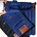 2024 nuovi jeans da lavoro alla moda da uomo stile classico pantaloni jeans slim elasticizzati casual pantaloni in denim di marca maschile nero blu