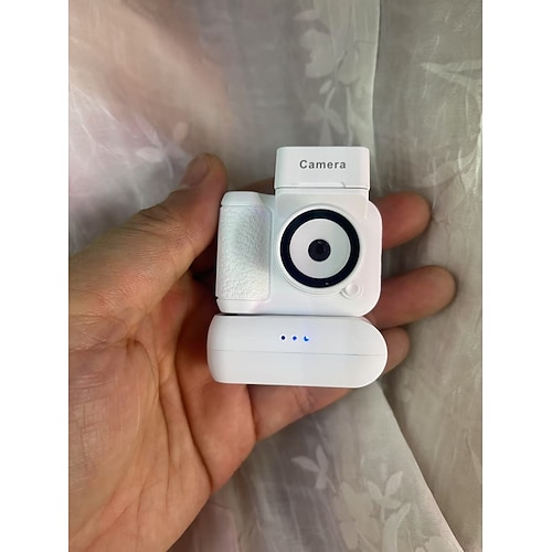 Mini macchina fotografica digitale retrò HD 1080p per studenti, portachiavi portatile con flash e vano batteria mobile per la registrazione di foto e video.