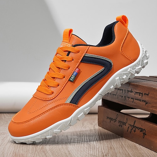 Orangefarbene, leichte Laufsneaker für Herren mit kontrastierenden marineblauen Streifen, atmungsaktive Sportschuhe fürs Fitnessstudio, Outdoor-Training und tägliche Spaziergänge Image