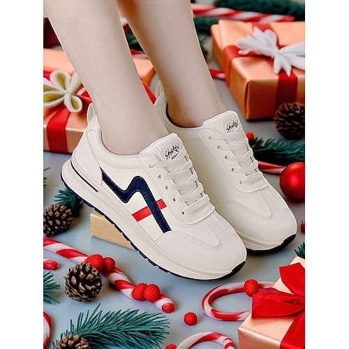 Lässige Damen-Sneaker mit roten und marineblauen Streifen – bequem und trendy für weihnachtliche Freizeitoutfits und festliche Aktivitäten Image