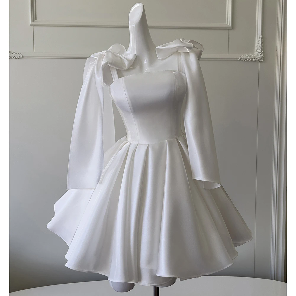 Weiße Satin-Schleife, Spaghettiträger, Cocktailkleider, A-Linie, knielang, kurze Partykleider, Heimkehrkleider, formelle Ballkleider Image