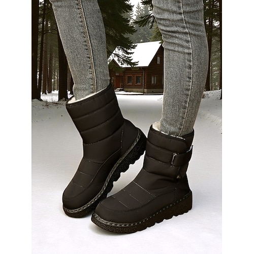 Blaue, gesteppte, wasserdichte Winterstiefel für Damen mit weichem Fleecefutter – isolierte und stylische Outdoor-Stiefel für Schnee, Wandern und Winteraktivitäten Image