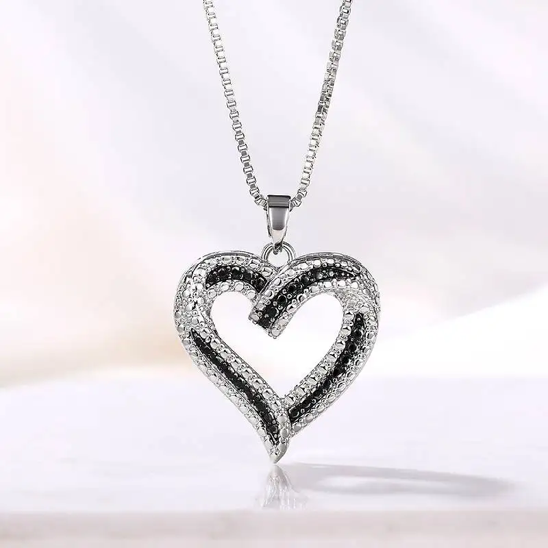 Huitan Herz-Design-Halskette mit Anhänger für Damen, eingelegt, schwarz/weiß, Zirkonia, elegante Party, Alltag, Accessoires, zurückhaltender Schmuck Image