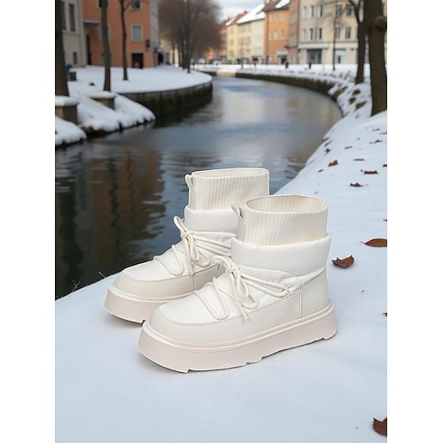 Damen-Winterstiefel aus mandelfarbenem Strick mit Schnürsenkeln und Kunstpelzbesatz – warme, wasserdichte Schneestiefel für Winterabenteuer und Spaziergänge im Freien Image