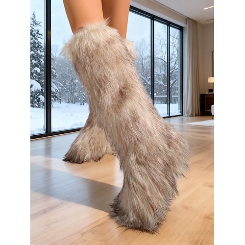 Pinkfarbene kniehohe Schneestiefel für Damen aus Kunstfell – stilvolles Winterschuhwerk, trendige Freizeitstiefel für kaltes Wetter und Outdoor-Abenteuer Image