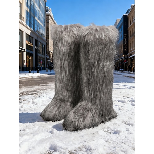 Pinkfarbene kniehohe Schneestiefel für Damen aus Kunstfell – stilvolles Winterschuhwerk, trendige Freizeitstiefel für kaltes Wetter und Outdoor-Abenteuer Image