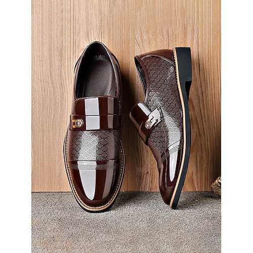 Braune Herren-Loafer mit Krokodilmuster zum Hineinschlüpfen – Luxus und Komfort für Geschäftstreffen, formelle Anlässe, Freizeitaktivitäten und Hochzeiten. Image