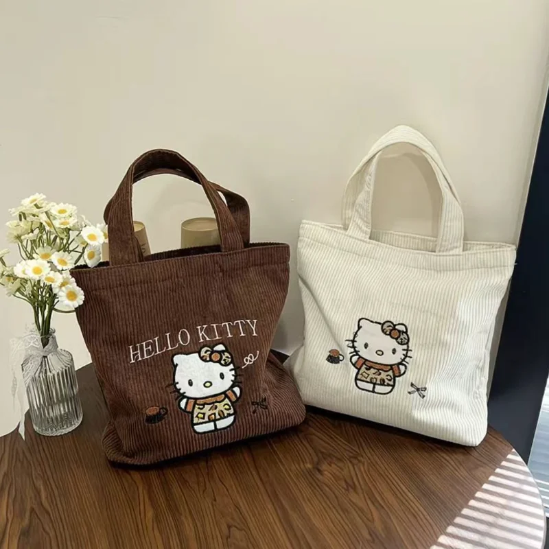 Sanrio Hello Kitty Anime Peripherie Stickerei Cord Handtasche Elegante Mädchen Ausgehen Große Kapazität Lagerung Vielseitiger Stil Täglich
