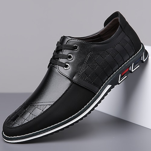 Braune und schwarze Herren-Sneaker aus Kunstleder – stilvolles, bequemes und vielseitiges Schuhwerk für Freizeit, Büro und Alltag. Image