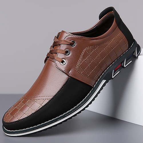 Braune und schwarze Herren-Sneaker aus Kunstleder – stilvolles, bequemes und vielseitiges Schuhwerk für Freizeit, Büro und Alltag. Image