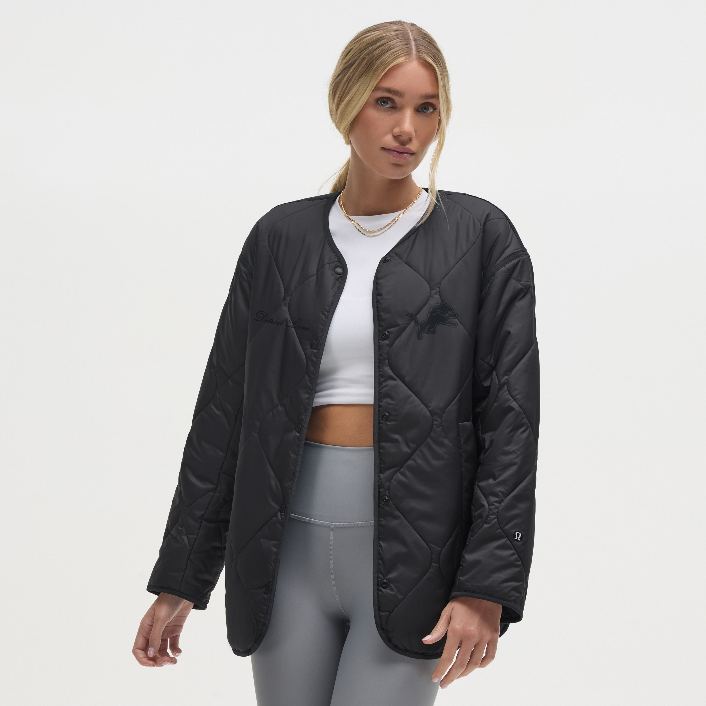 Damen-gesteppte, isolierte Lululemon Obsidian Detroit Lions-Innenjacke mit durchgehendem Druckknopfverschluss Image