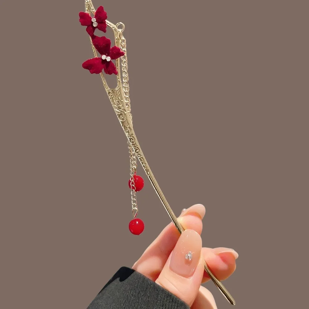 Orientalischer Haarstab, rote Schmetterlinge, kompliziert, filigran, romantisch, elegantes Design, perfektes traditionelles, besonderes festliches Accessoire Image