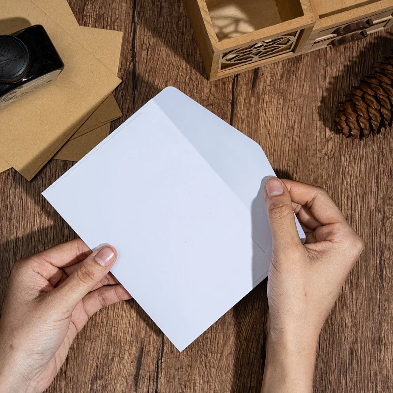 10 Stück europäischer leerer Retro-Kraftpapierumschlag, 22 x 11 cm, selbstklebende Umschlagtasche aus weißem Kraftpapier Image