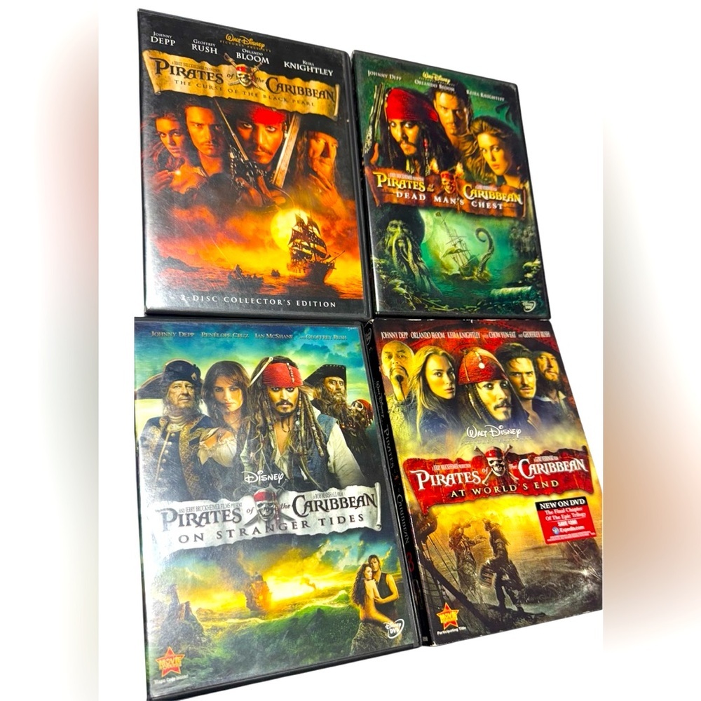 Disney Media | Disney’s Pirates Of The Caribbean 4 Dvd Movie Bundle. | Color: Black/Green | Size: Os