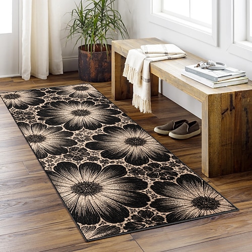 Läuferteppich mit floralem Muster in Schwarz und Beige, strapazierfähig und pflegeleicht, ideal für Flur, Küche oder Eingangsbereich. Image