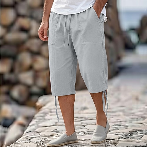 Herren Hose aus Baumwollleinen Caprihose Sommerhose Strandshorts Kordelzug Elastischer Bund Fronttasche Einfarbig Komfort Knielang Lässig Täglich Outdoor Urlaub Stilvoll Blau Schwarz Unelastisch Image