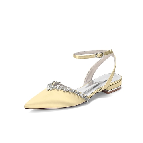 Elegante, elfenbeinfarbene, kristallverzierte Brautschuhe mit Knöchelriemen für eine Gartenhochzeit im Freien Image