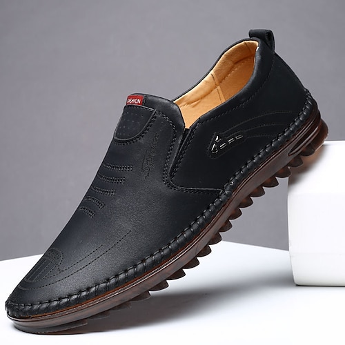 Lässige Herren-Slipper aus Kunstleder, bequem und vielseitig, ideal für entspannte Ausflüge oder Abende im Resort. Image