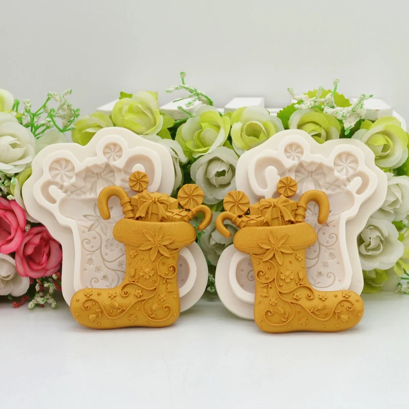 Weihnachtsdekorationsformen, Stiefel und Schuhe, Weihnachtsgeschenke, Backformen für Schokoladenfondant, Silikonformen für Kuchen Image