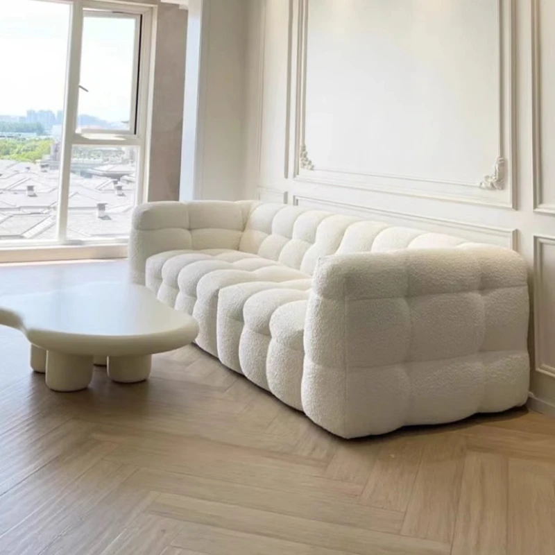 Minimalistisches wasserdichtes Wohnzimmersofa, moderne Couch, elegantes, entspannendes Wohnzimmersofa, weißer Puff, Sofy Do Salonu Wohnmöbel Image